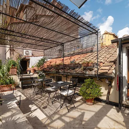 Orange Room With Bathroom And Shared Terrace